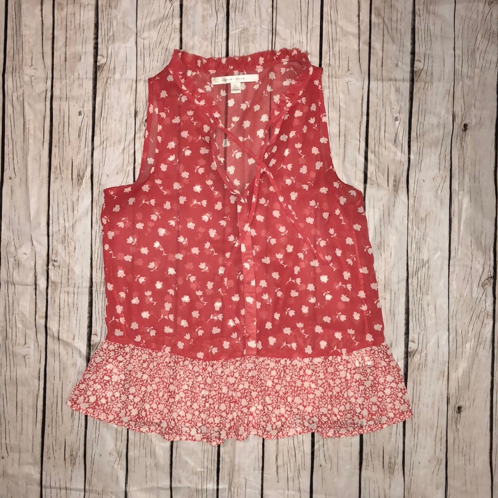 Red peplum semi-sheer blouse